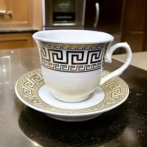 Juego de té de porcelana de diseño griego de 12 piezas taza y platillos diseño dorado blanco - Imagen 1 de 3