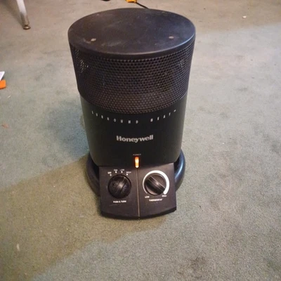 Calentador digital envolvente Honeywell 360 negro HZ 2206.                  Foto 1 de 4