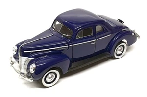 Universal Hobbies 1/18 Scale Diecast 2625L - 1940 Ford Deluxe - Blue - Picture 1 of 5