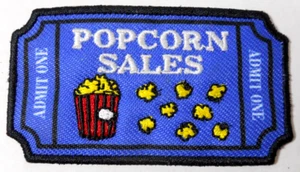 Parche de anuncio promocional novedad trozo de boleto de película vintage Popcorn Sales - Imagen 1 de 2