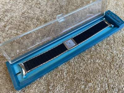 Correa de reloj vintage Kreisler EE. UU. 1969 calendario expansión 19 mm plateada/negra NOS Foto 1 de 4