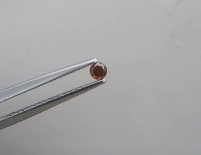 2.8mm Cognac Red Natural Diamond loose faceted round 0.10 carat  - Image 1 of 4