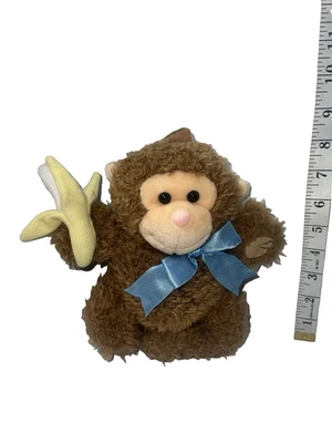 Kids II Musical Monkey 1999 con cuerda de tirar de felpa de plátano *Funciona vintage arco azul Foto 1 de 4