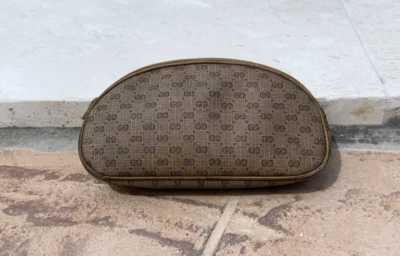 BOLSO COSMÉTICO VINTAGE GUCCI CUERO MARRÓN CLARO LOGOTIPO CREMALLERA DETALLE SUPERIOR HECHO EN ITALIA Foto 1 de 4