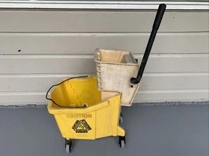 Rubbermaid Commercial Dual Water Mop Bucket 7570 and Press Wringer Co 6127 - Picture 1 of 12