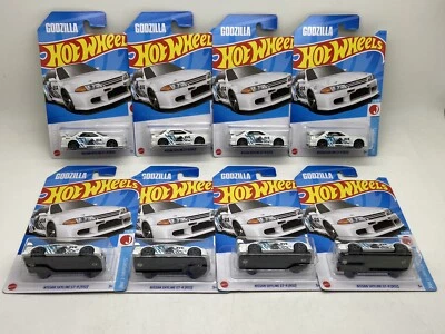 8 Hot Wheels 2023 Godzilla Nissan Skyline GT-R R32 bianco - Immagine 1 di 4