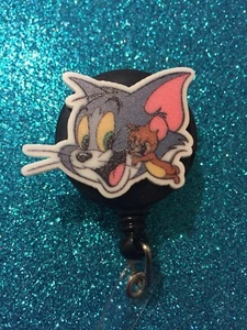 Von Tom und Jerry inspirierter einziehbarer Abzeichenrollenhalter - Bild 1 von 3