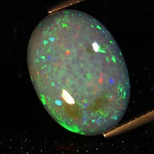 Piedra preciosa ovalada ópalo blanco Etiopía juego de colores naturales de 5,96 quilates REF-VIDEO - Imagen 1 de 5