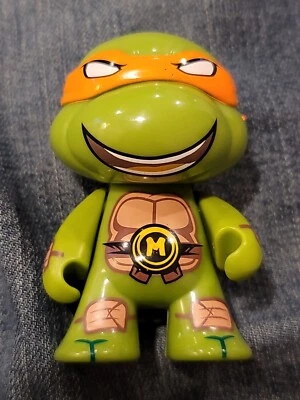Figura de acción Kidrobot TMNT 2014 Michaelangelo 3" Foto 1 de 3