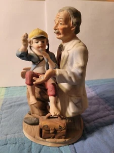 Porcelain Doctor Pediatrician Physician Child In Lap Figurine - ARNART IMPORTS - Picture 1 of 7