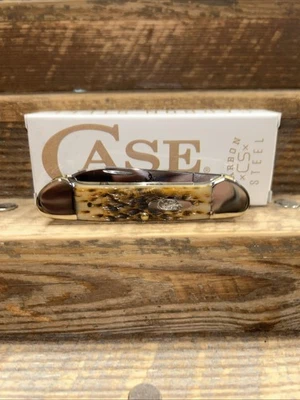 CASE XX AMBER BONE PEACH SEED JIG CANOE KNIFE CA 00263 USA 2024 CARBON STEEL - Image 1 of 4