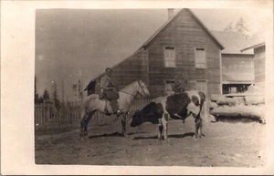 Man on Horse with Cow and Barn RPPC - Picture 1 of 2