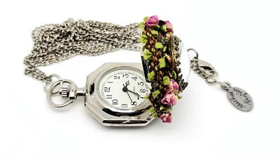 Reloj colgante vintage con flores de colores de Michal Negrin. Foto 1 de 4