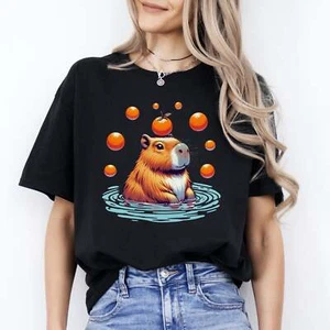 Capibara swimming with balls and apples T-Shirt gift Capibara mom Unisex tee Bla - Picture 1 of 10