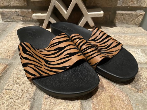 Scivolo Vans in pelle con stampa animalier