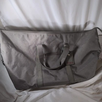 Oversized Gray Nylon  Tumi Travel Bag With Leather Luggage Tag Straps 30x15x13 - Image 1 of 4