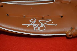 Greg Swindell Signed Cleveland Indians Logo SGA Glove W/ Photo of Signing - Picture 1 of 3
