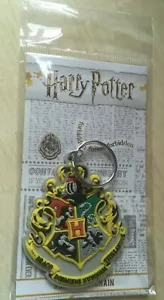 Brandneu in Verpackung neu offizieller Harry Potter Schlüsselanhänger Schlüsselanhängsel - Hogwarts Schulwappen - Bild 1 von 3