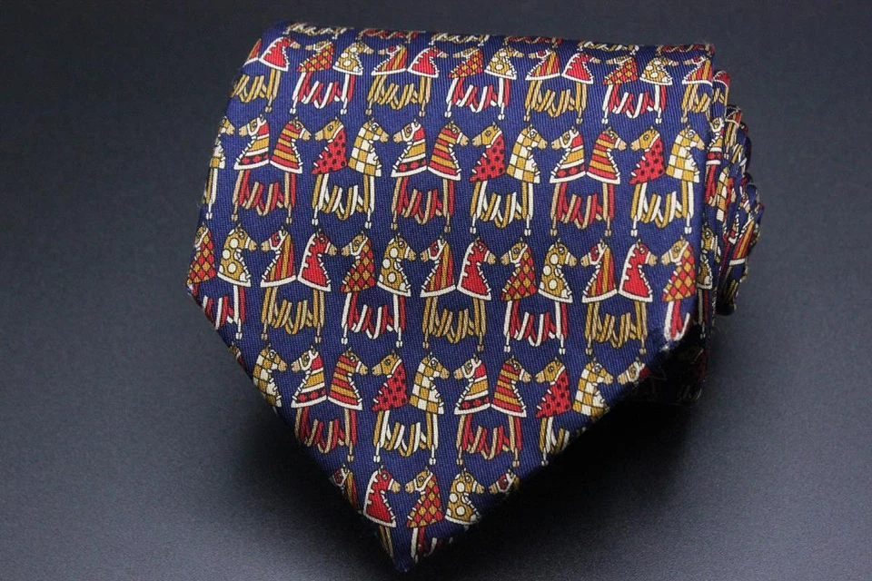 Corbata SALVATORE FERRAGAMO. Azul con cabeza de caballo marrón y rojo / motivo ecuestre. Foto 1 de 4
