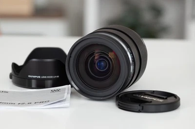 Olympus 12-40mm Pro  F/2.8 AF ED Zoom Lens w/hood Mint - Black - Image 1 of 4