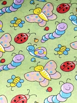 Tela de algodón rosa mariposas azul púrpura caracoles dama insectos en verde claro 3,9 años Foto 1 de 3