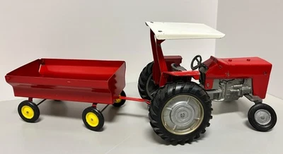 Tractor y remolque de juguete fundido a presión Ertl vintage Massey Ferguson 1103 rojo Foto 1 de 4
