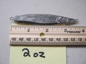 7 - 2 OZ FLUTTER FISHING SPOONS JIGGING CASTING LEAD SLAB  FRESH & SALT WATER. - Picture 1 of 1