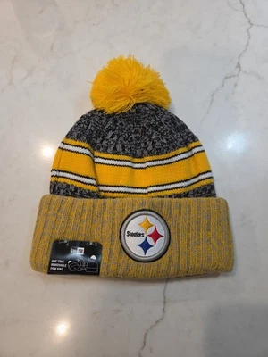 New Era Pittsburgh Steelers 2023 sombrero tejido lateral (pompón extraíble) Foto 1 de 2