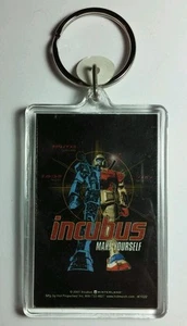 AS-IS INCUBUS MAKE YOURSELF ROBOT RED WHITE BLUE KEY CHAIN KEYCHAIN - Bild 1 von 1