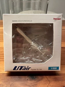 Herpa Wings 504973 UTair Aviation Tupolev Tu-134 1:500 Modell OVP RA-65614 - Bild 1 von 7