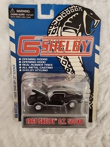 NOS Shelby Collectibles 1968 GT500KR Cabrio nero 1/64 modello pressofuso - Foto 1 di 2