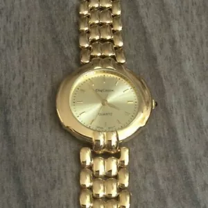 Reloj para mujer Oleg Cassini dorado acabado espejo esfera dorada redonda fácil de leer ¡Nuevo! - Imagen 1 de 3