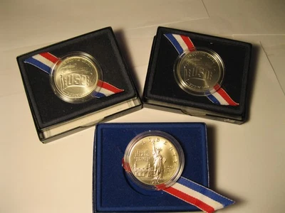 3- $1 UNCIRCULATED COMMEMORATIVES SILVER DOLLARS 90% SILVER! U.S.O. & LIBERTY - Image 1 of 2