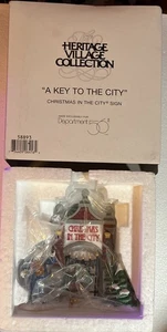 A Key To The City Department 56 Heritage Village, Christmas In The City Sign - Picture 1 of 3