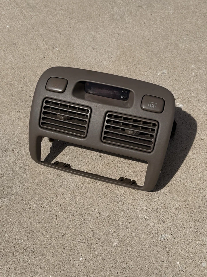 Toyota Corolla 1998-2002 interior consola central bisel con reloj. OE ✅ Foto 1 de 3