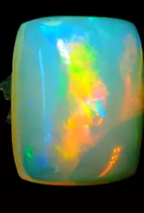 9.9ct Welo Opal Cushion Cabochon AAA+ Ethiopian Rolling Flash VIDEO - Picture 1 of 10