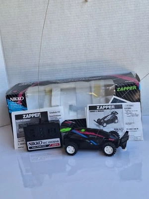 Vintage Nikko Pocket Flyers Remote Control (RC) Electric 1:32 Zapper - Working - Image 1 of 4