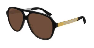 Gafas de sol tintadas Gucci GG0688S-005 para hombre negras y amarillas/marrones Foto 1 de 3