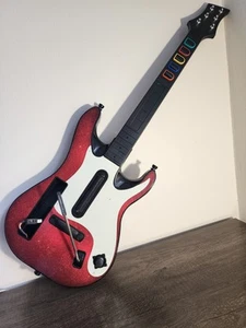 Controller Wireless Guitar Hero 5 NON TESTATO 95911.805 Rosso Bianco Starburst per Wii - Foto 1 di 9