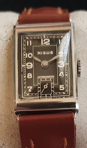 Vintage Armbanduhr Nisus in Edelstahl – Handaufzug - Cal. ETA 735 - Bild 1 von 8