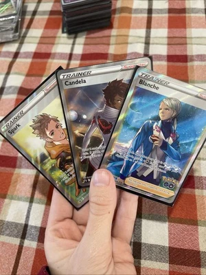 Tarjetas Chispa, Blanca y Candela ARTE COMPLETO PROMOCIONES ESTRELLA NEGRA - Pokémon Go Foto 1 de 4