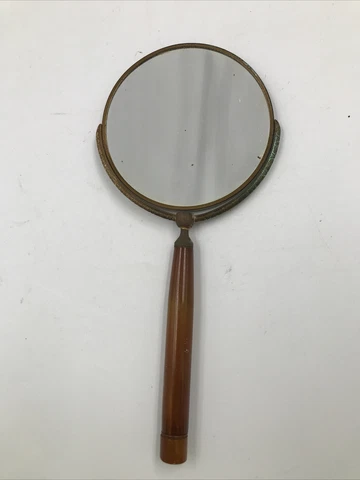 Antique Magnifying Brass Mirror and Bakelite Handle Cover