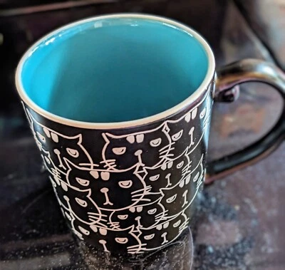 Taza de café Spectrum Cats 20 oz diseño blanco y negro con interior azul turquesa Foto 1 de 4