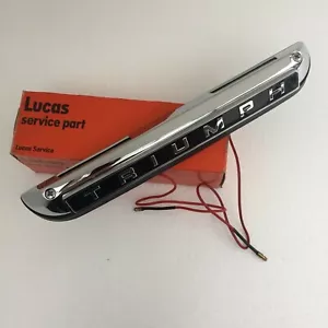 LUCAS L766 NUMBER PLATE LAMP & TRIUMPH BADGE ASS. OEM NO.718028 LUCAS 54866 STAG - Picture 1 of 6