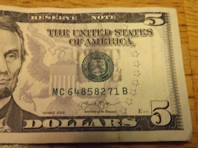 2013 ERROR NOTE BROKEN AXLE SPACED DIGITS "71" FIVE DOLLAR BILL - MC 648582 71 B - Image 1 of 3
