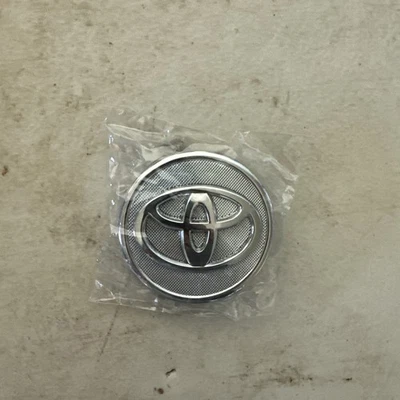 Tapa central de rueda genuina Toyota cromada plateada Yaris Corolla Prius OE 42603-52110 Foto 1 de 2