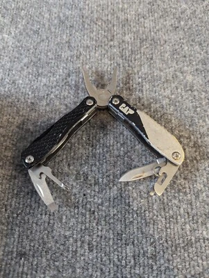 Multiherramienta Cat 12 en 1 (negro y amarillo / pulido) -  Foto 1 de 4