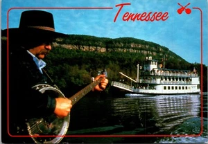 Banjo player in front of river boat Tennessee Continental Postcard F3 - Picture 1 of 2