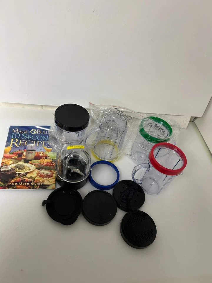 Accesorios de repuesto Magic Bullet 5 tazas, 4 anillos, 5 tapas, 1 hoja plana con taza Foto 1 de 4
