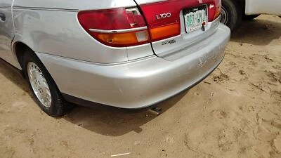 Conjunto de cubierta de parachoques trasero Saturn L100 2000-2002 OEM trasero plateado 12u 90584254 Foto 1 de 4